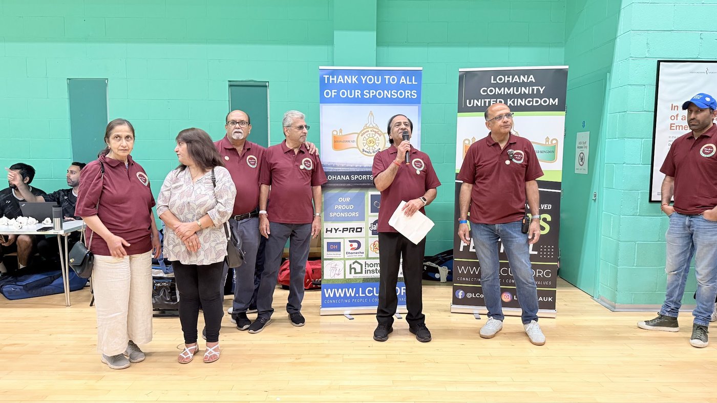 The LCUK committee in front of the 2025 sponsors banner at the Sports Festival