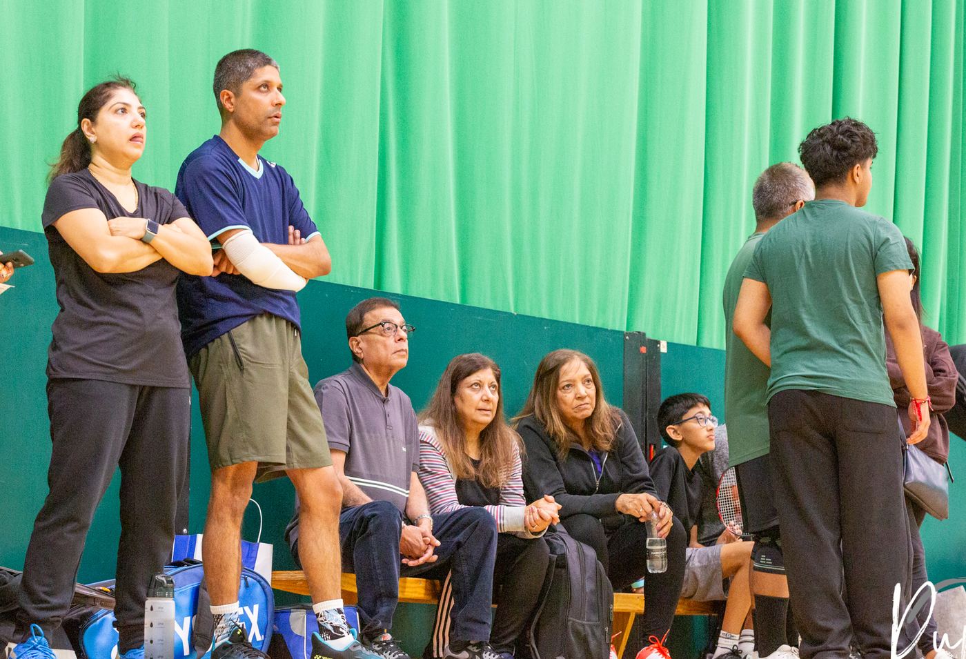 The crowd watching courtside