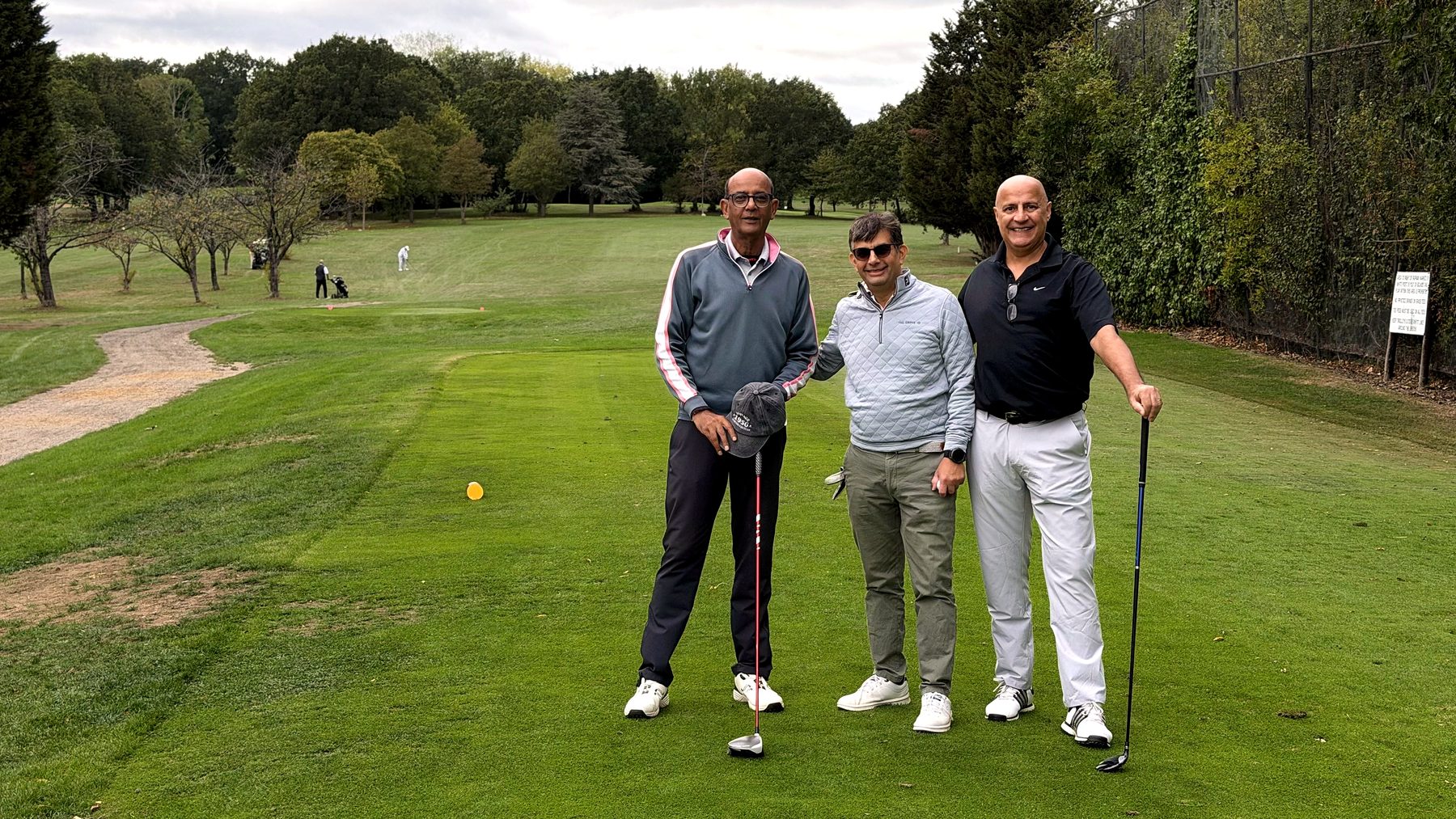Three players on the fairway at Stanmore Golf Club during Golf Day at the Lohana Sports Festival 2026
