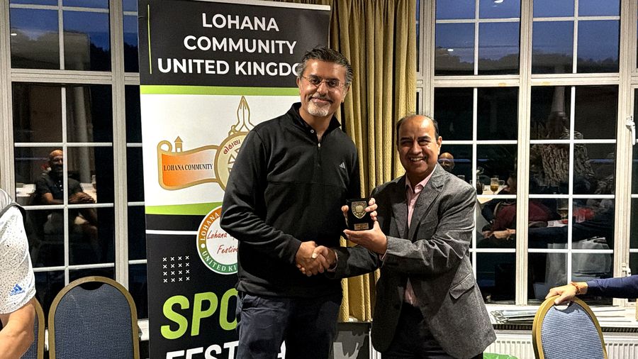 A Golf Day winner receiving his trophy at the evening presentation at Stanmore Golf Club