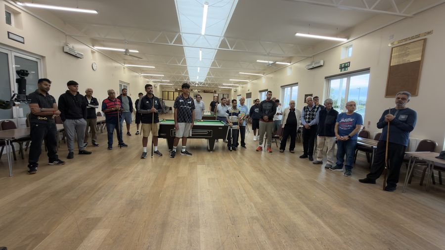 Lohana community members standing around a pool table at the RCT Centre in Harrow as the Lohana Sports Festival 2026 opens